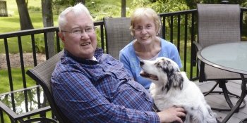 Hugh with his wife Georgia and dog Ella.