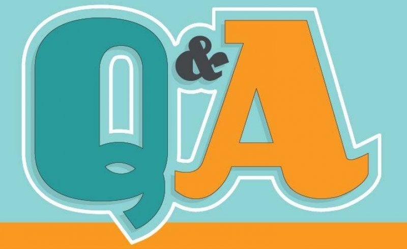 Large Q & A letters on a colored background.