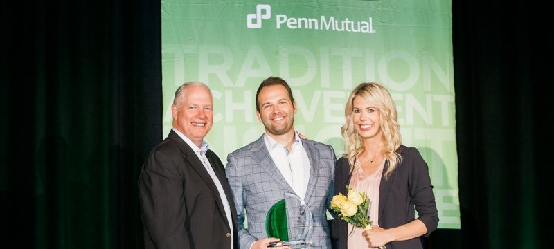 Bobby Fenby with wife and VP from Penn Mutual