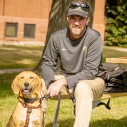 Roger Woods with his dog