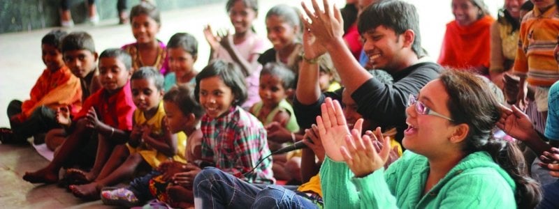 A group of students clapping