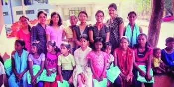 A classroom in India, with construction in the background