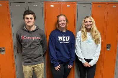 Houghton High School students Birk Seagren, Nadja Doman, and Layla Hilts