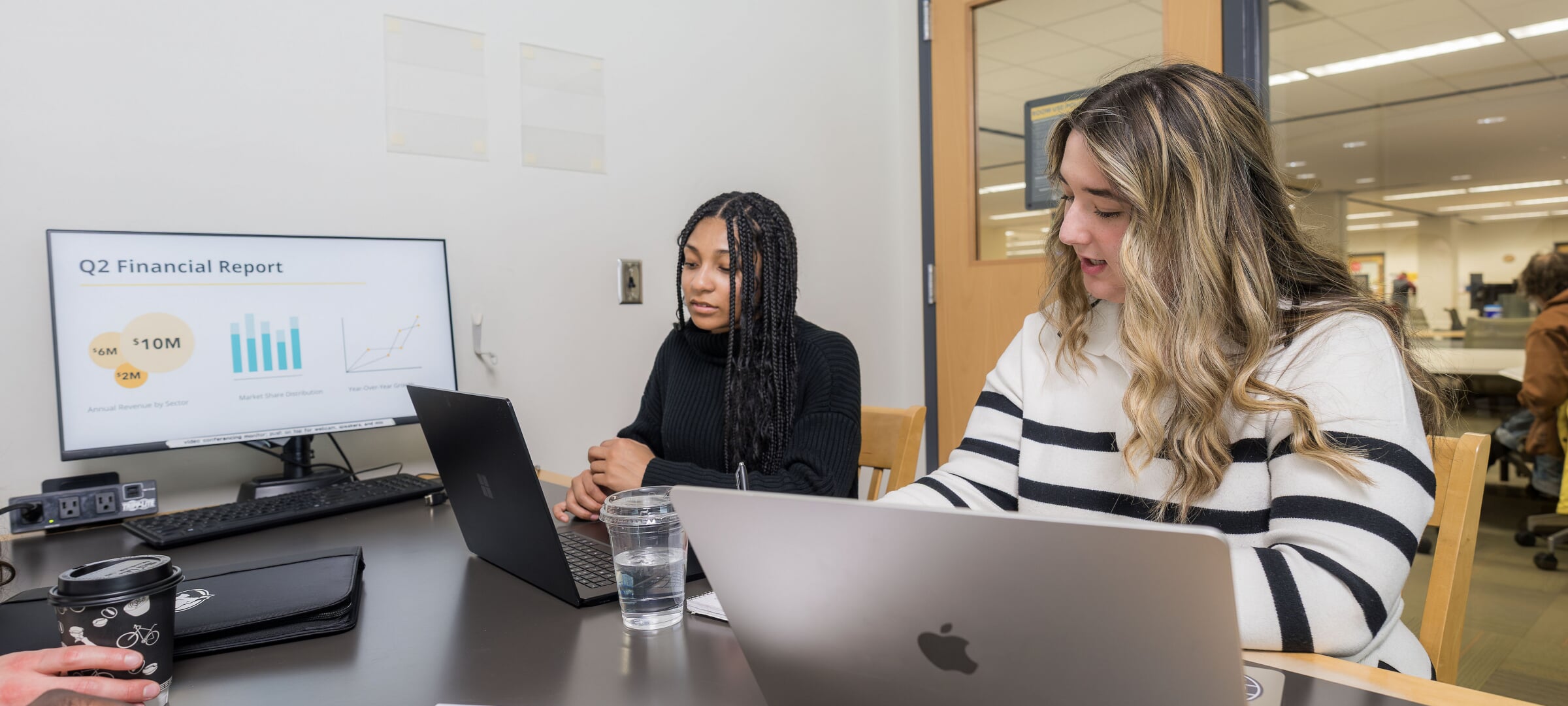 Students sitting at a table working together