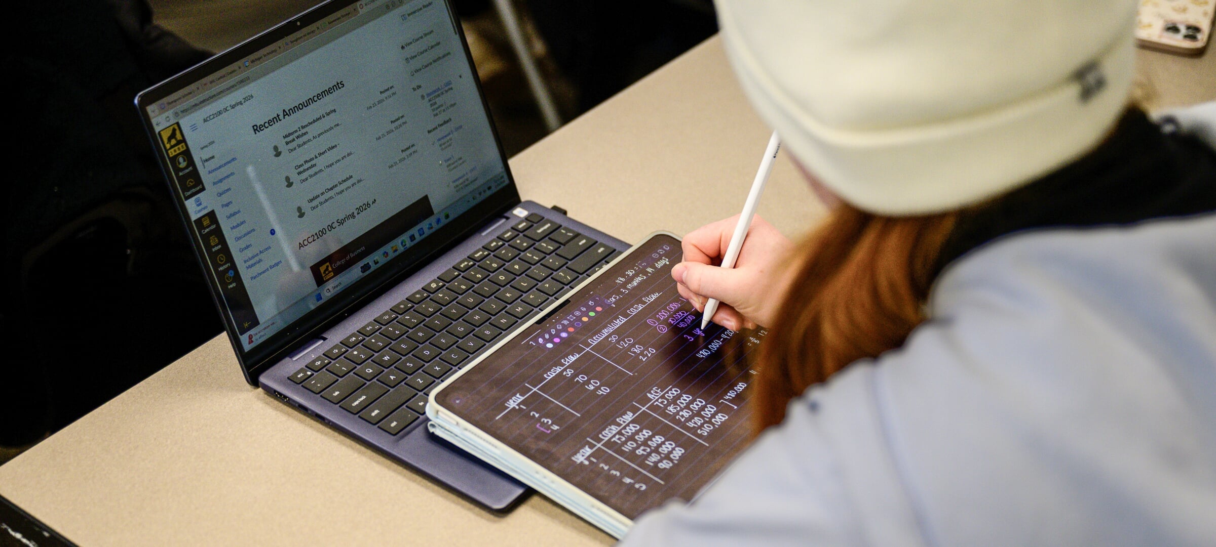A student records data on a device for analysis