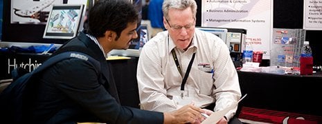 Student talking to a prospective employer.