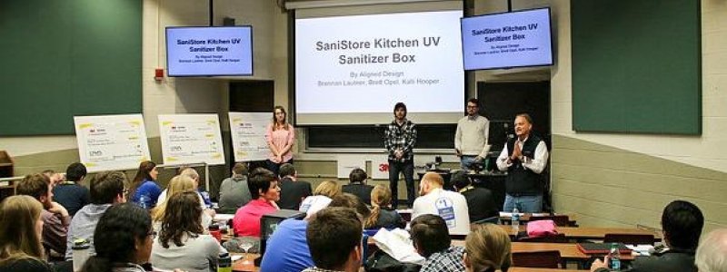 Students presenting the "SaniStore Kitchen UV Sanitizer Box" at the Consumer Products Challenge
