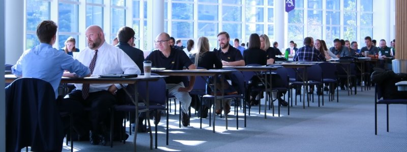 Students interviewing in the Rozsa Lobby