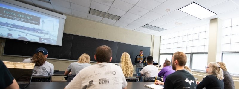 Student presentation in a classroom.