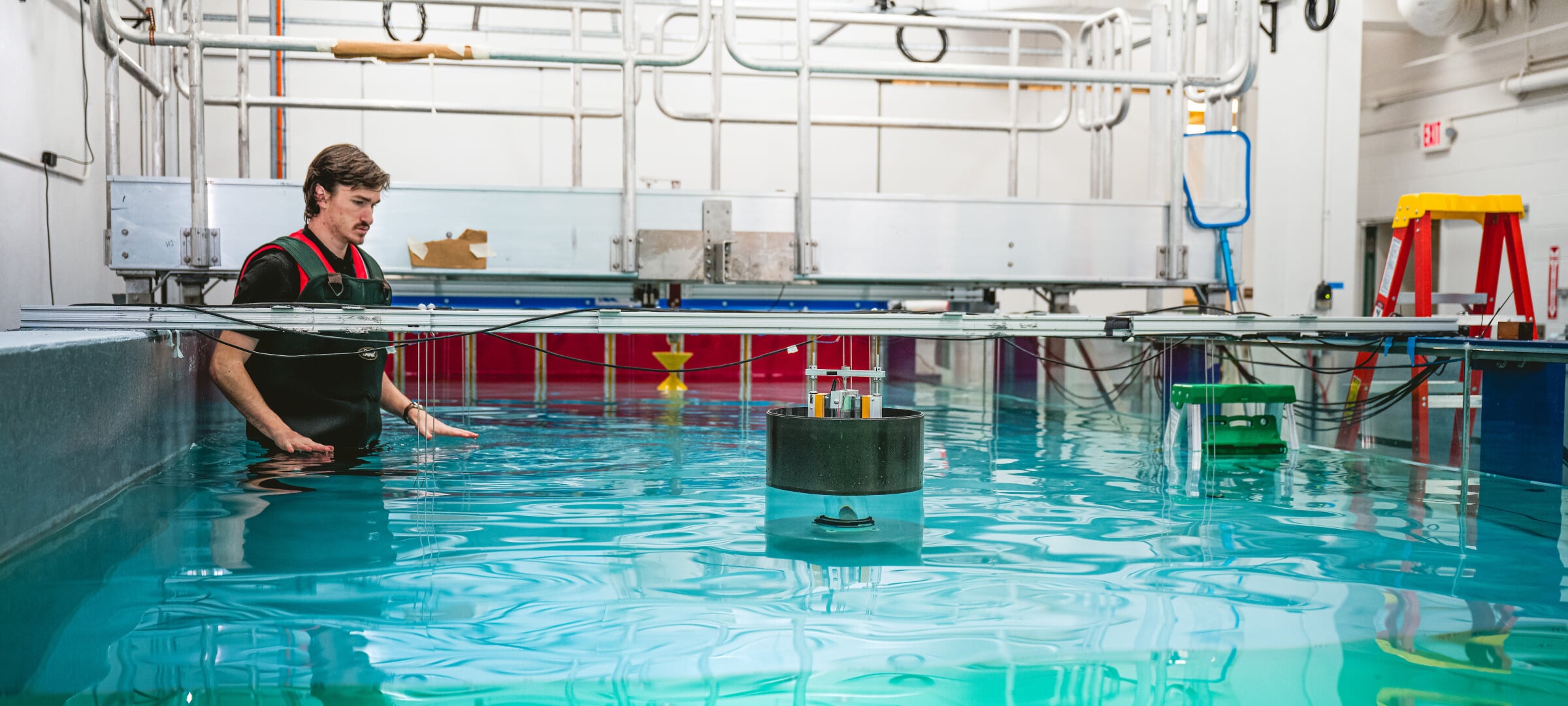 A student in a wave energy converting lab