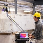 A student testing concrete.