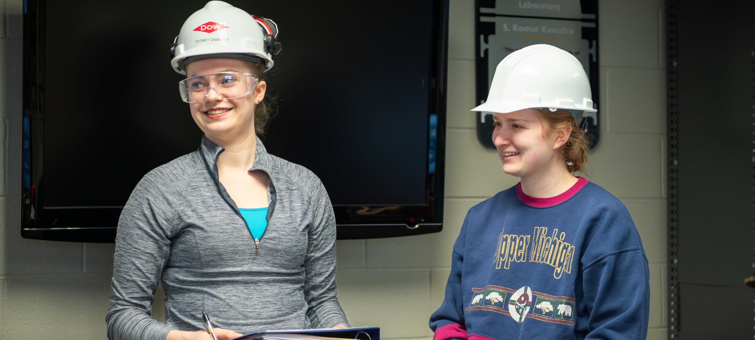 Two women in a hardhat