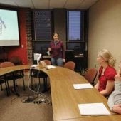 students in conference room