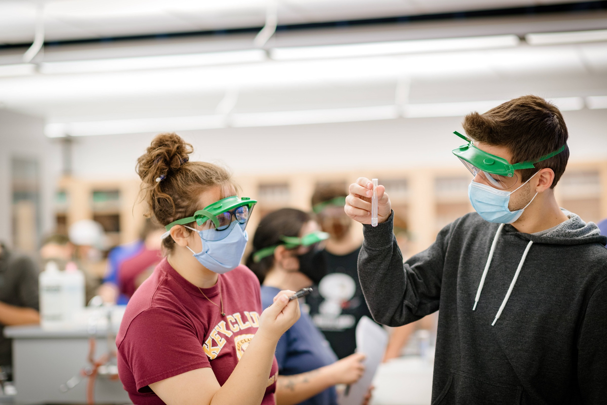 Chemistry student working in a lab.