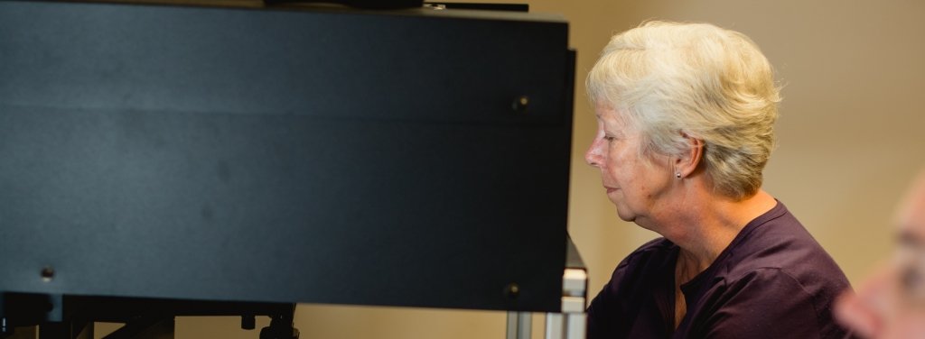 Person participates in a researcher's experiment.