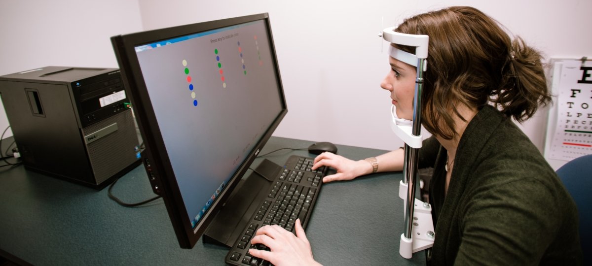 Student using eye tracker machine