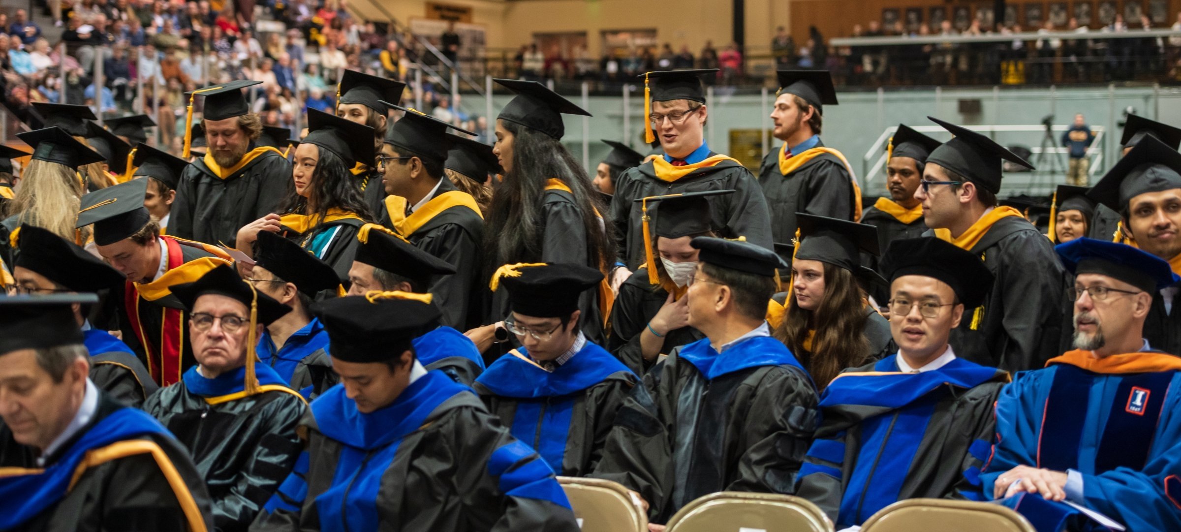 Graduate and PhD candidates at commencement