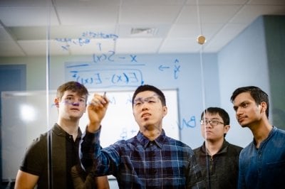 Assistant Professor Brian Yuan and students Tyler Zetty, Shiwei Ding, and Saket Chaturvedi