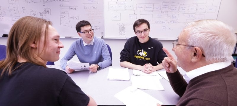 Faculty member Soner Onder, Computer Science, with CS graduate students
