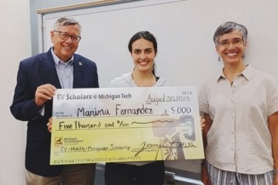 Industry Scholar James Hill, Marina Fernandez, BS in Mechanical Engineering student, and staff member Kay Oliver, former advisor to the Michigander Scholars program