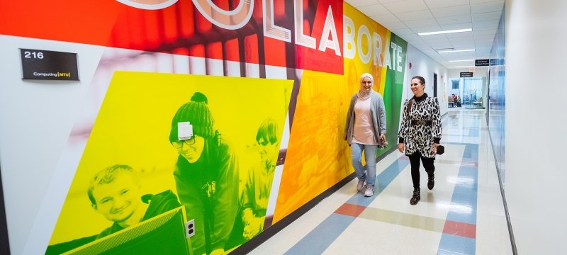 Department of Computer Science faculty members Briana Bettin and Serein Al-Ratrout in Rekhi Hall