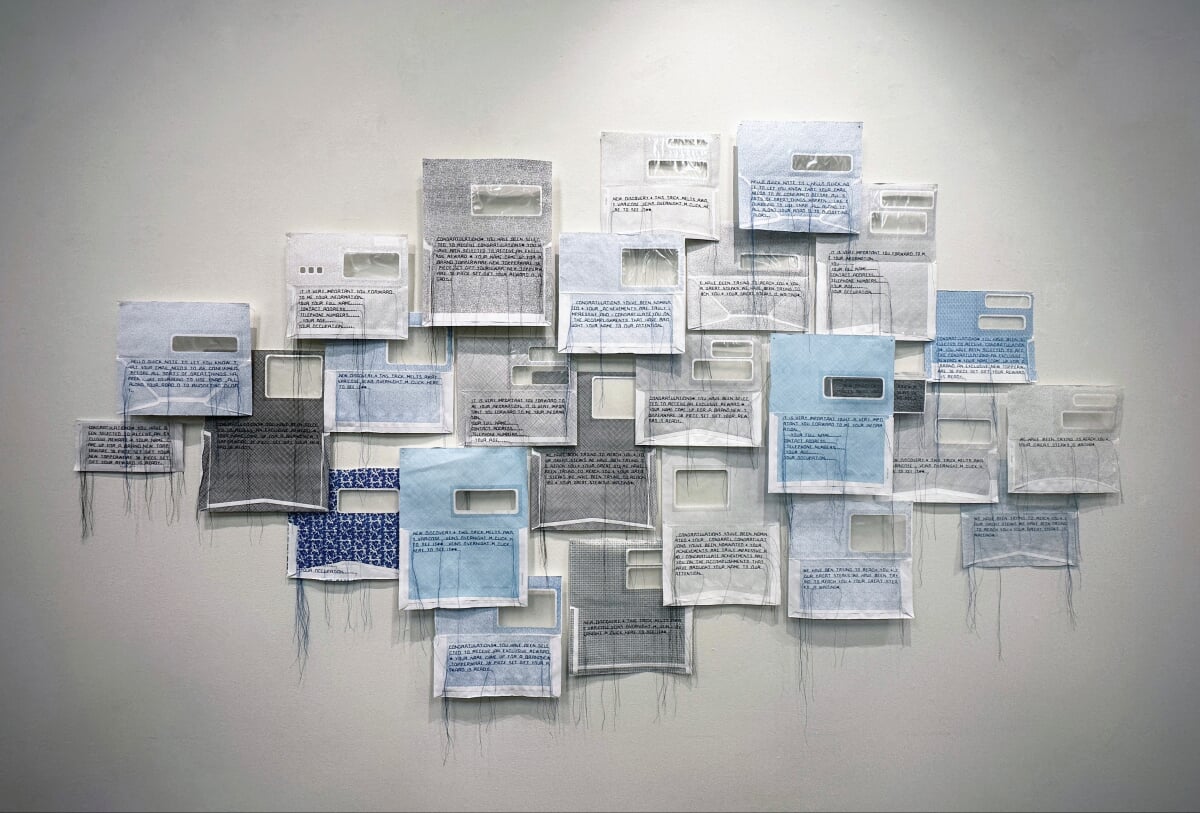Junkmail artwork featuring opened window envelopes with strings hanging from them.