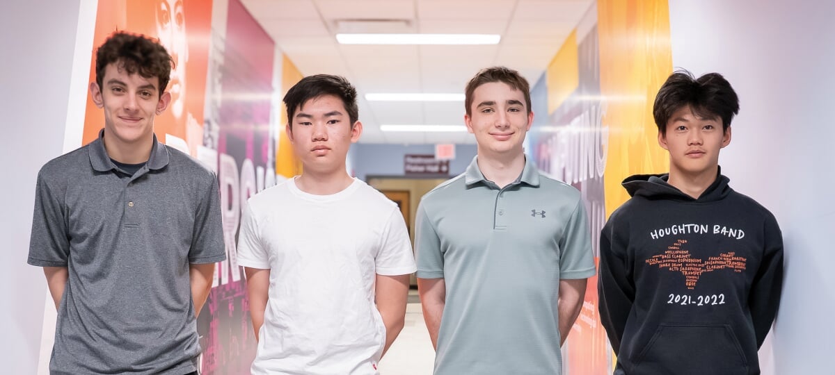 From left, Lewis Vendlinski, Samuel Cai, Gabe Hjerstedt, and Daniel Xie are members of the Houghton High School CyberHusky team that earned statewide recognition in the Presidential AI Challenge.