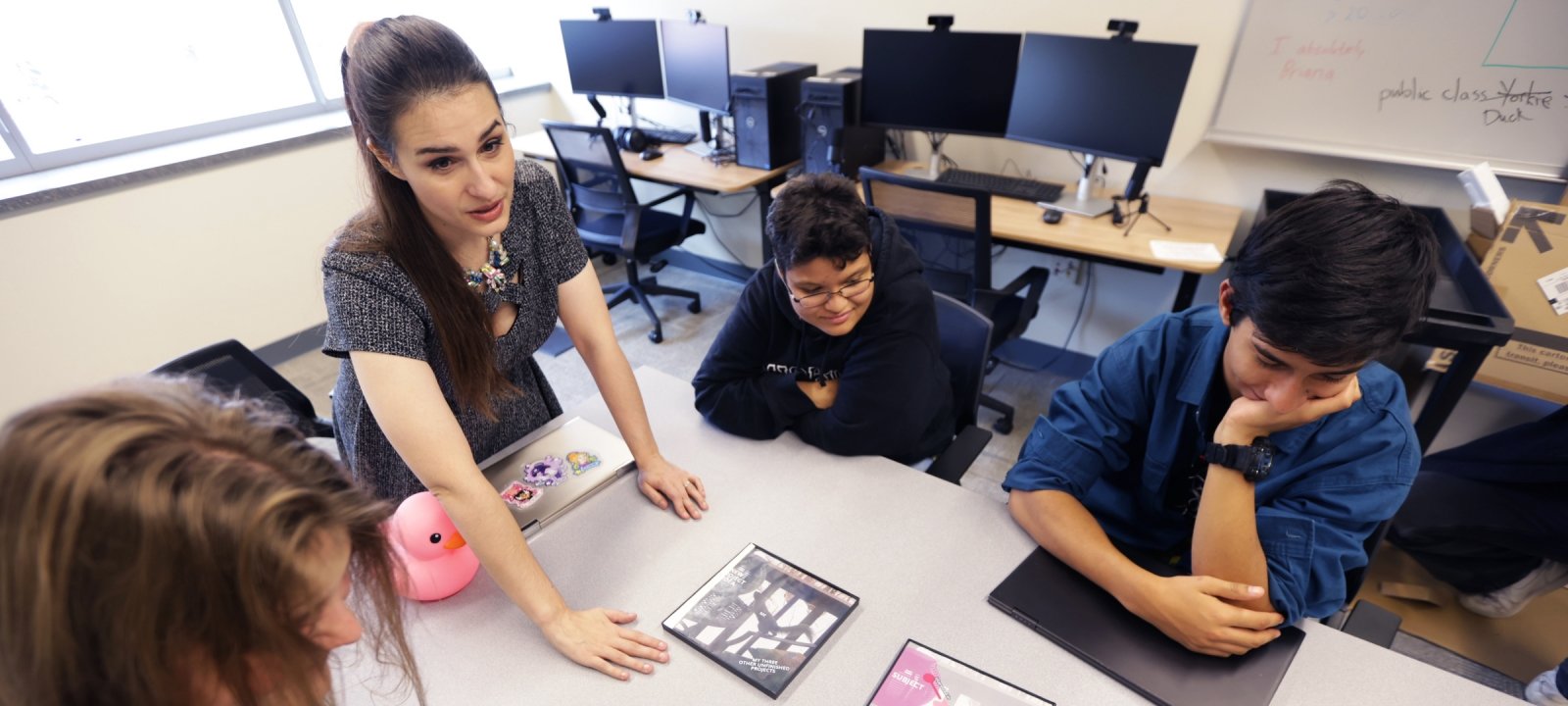 Michigan Tech students and a teacher