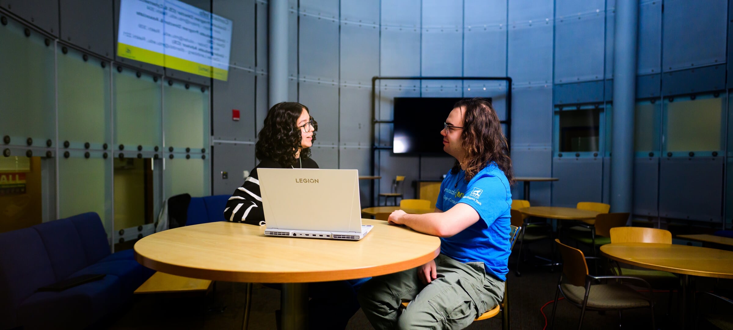 Two students with a laptop