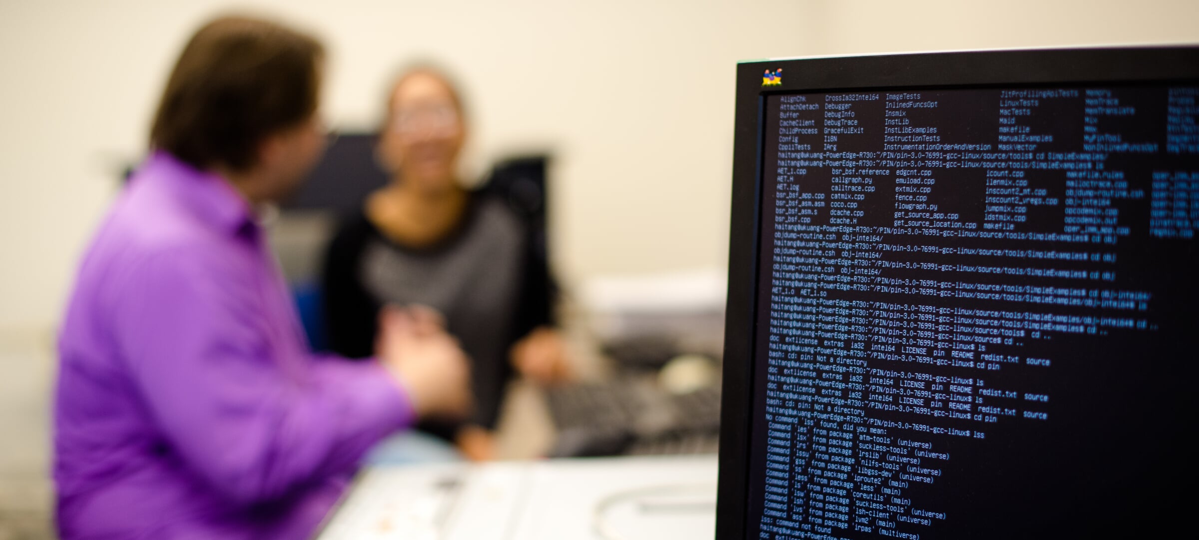 Two students in a research lab