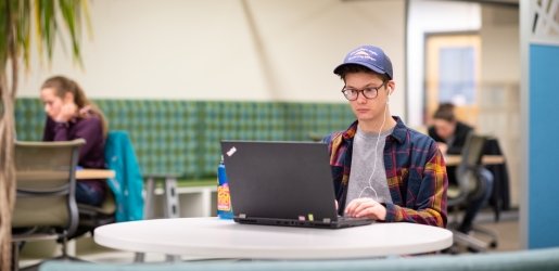 Student working on a laptop.
