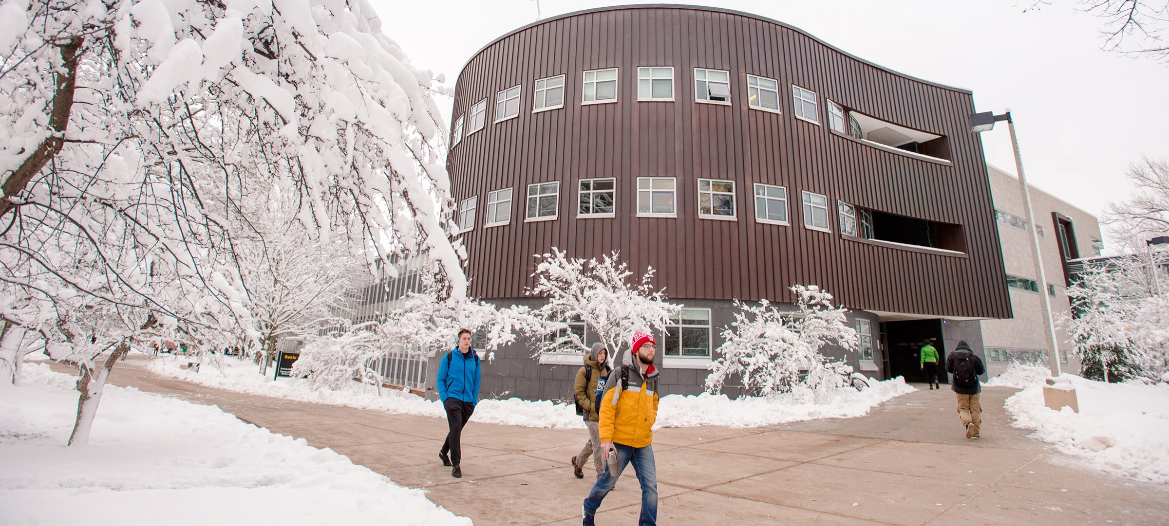 Exterior of Rekhi Hall in the winter.