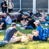 Students relax on the lawn