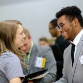 Career Fair student meets potential employer