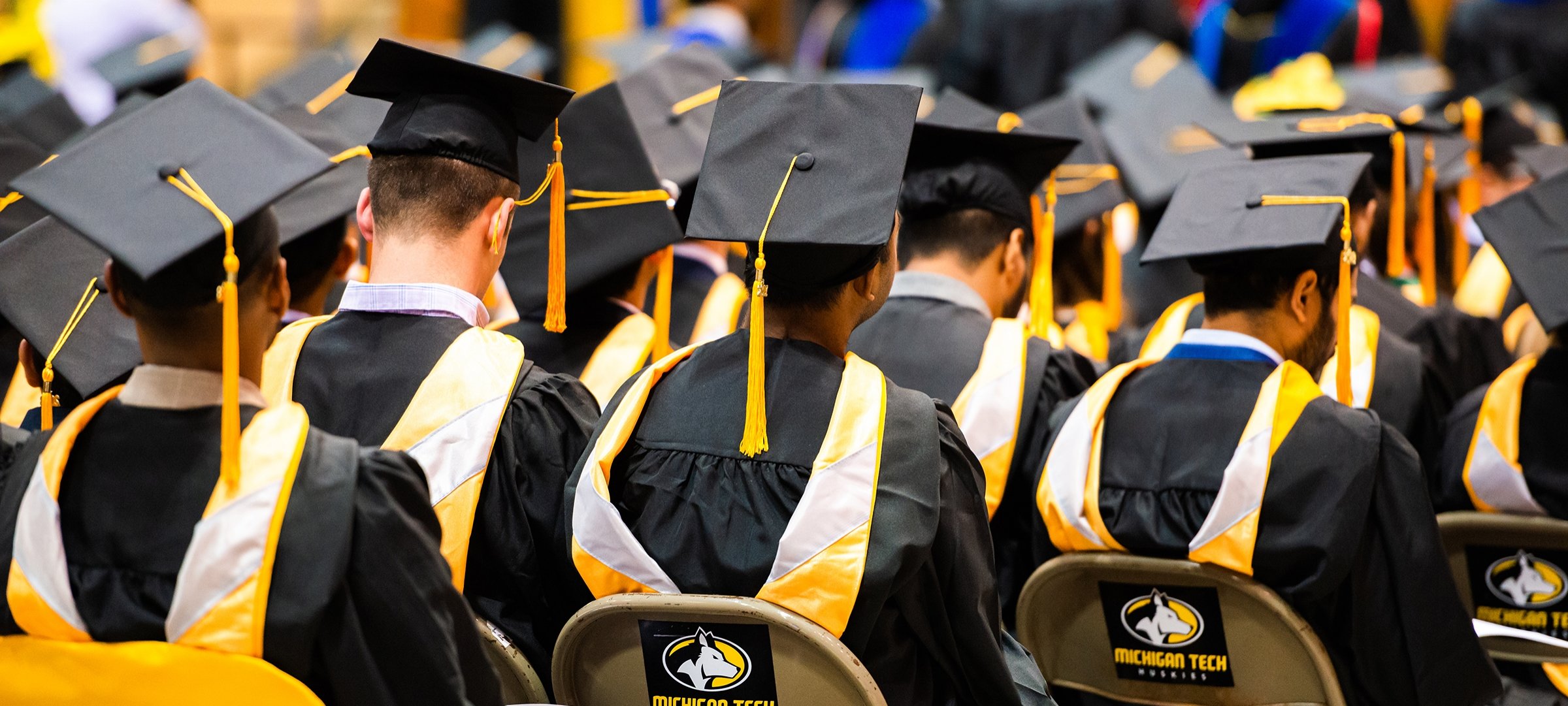 Graduates in caps at commencement