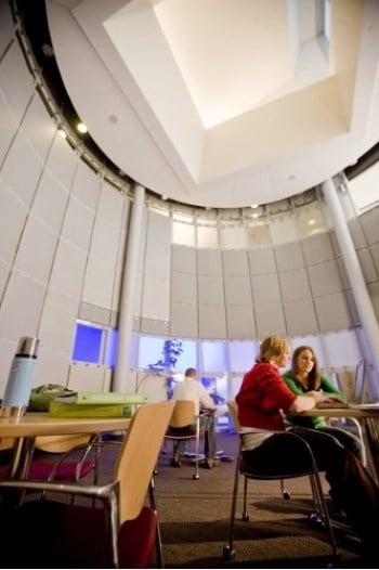 Michigan Tech computer science students studying in Rekhi Hall.