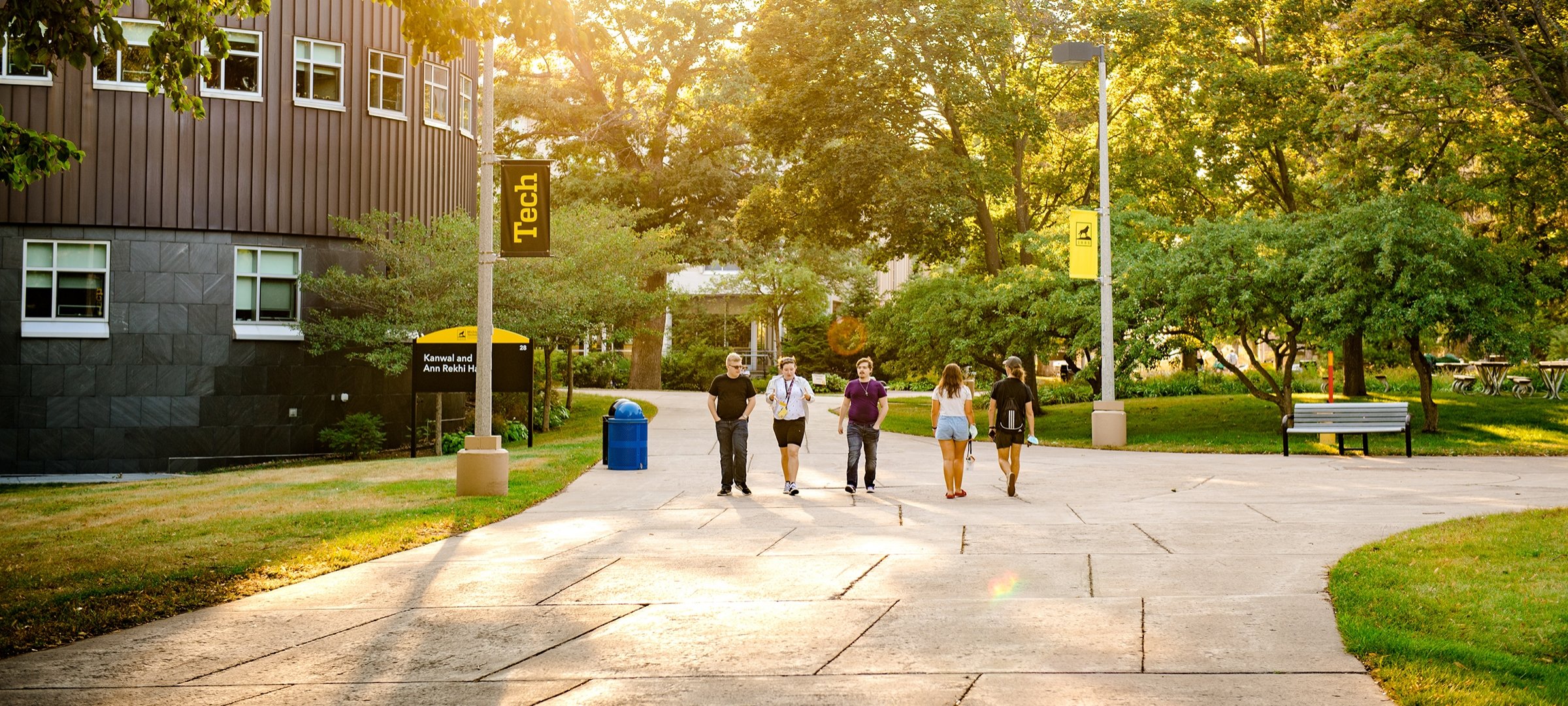 Students walking outside Rekhi Hall