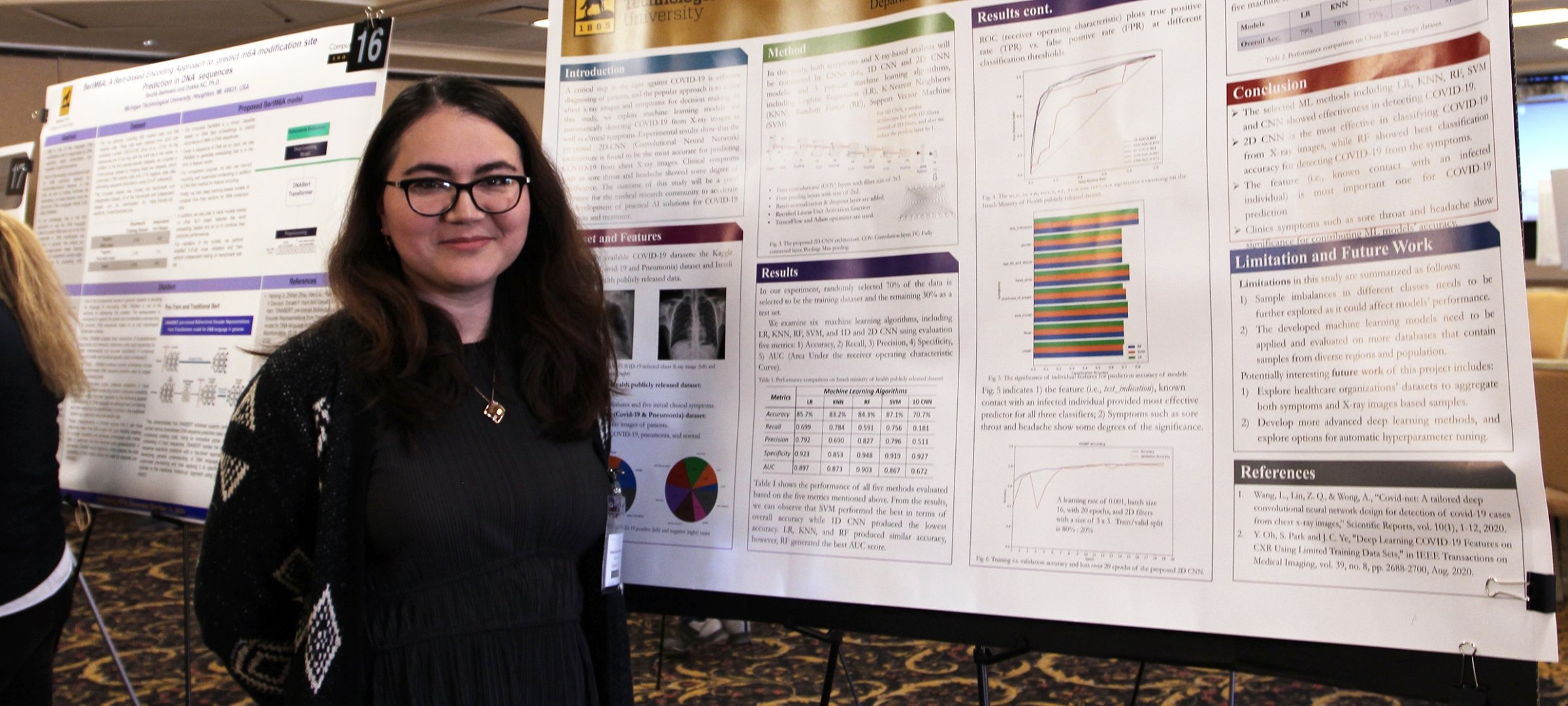 A graduate student displays her research poster