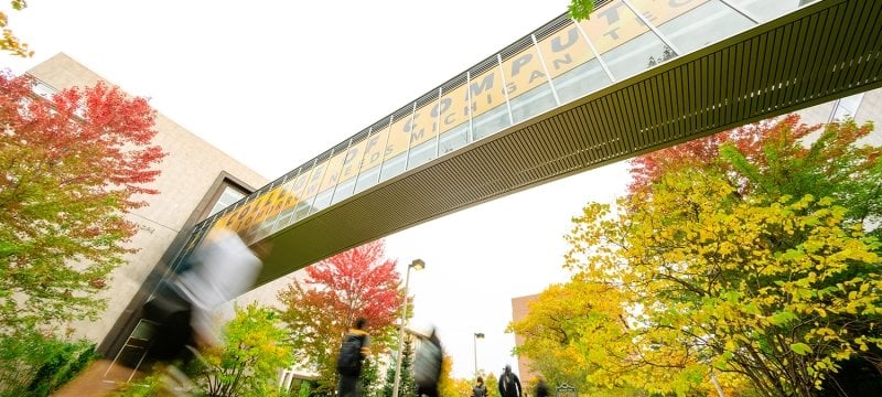 Students passing under Computing bridge