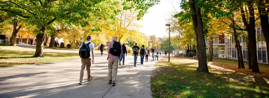 View of Campus Mall with students heading east next to Fisher Hall