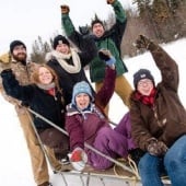 Group of students sledding.