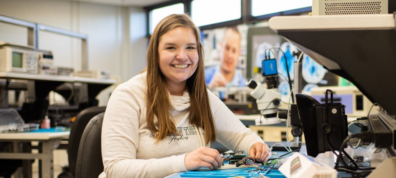 Student in electrical engineering lab.