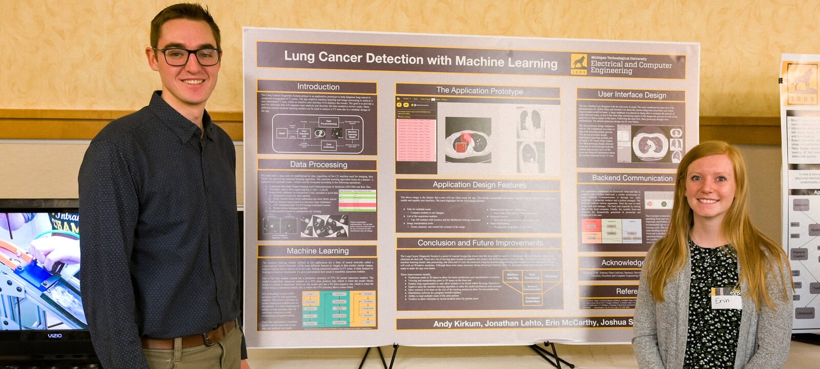 ECE students stand by their poster.