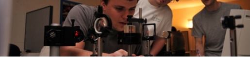 Student working with a laser. 