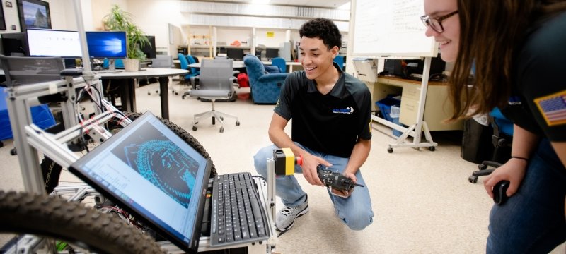 Robotics engineering majors work with hardware and computers.