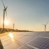 Wind turbines and solar panels.