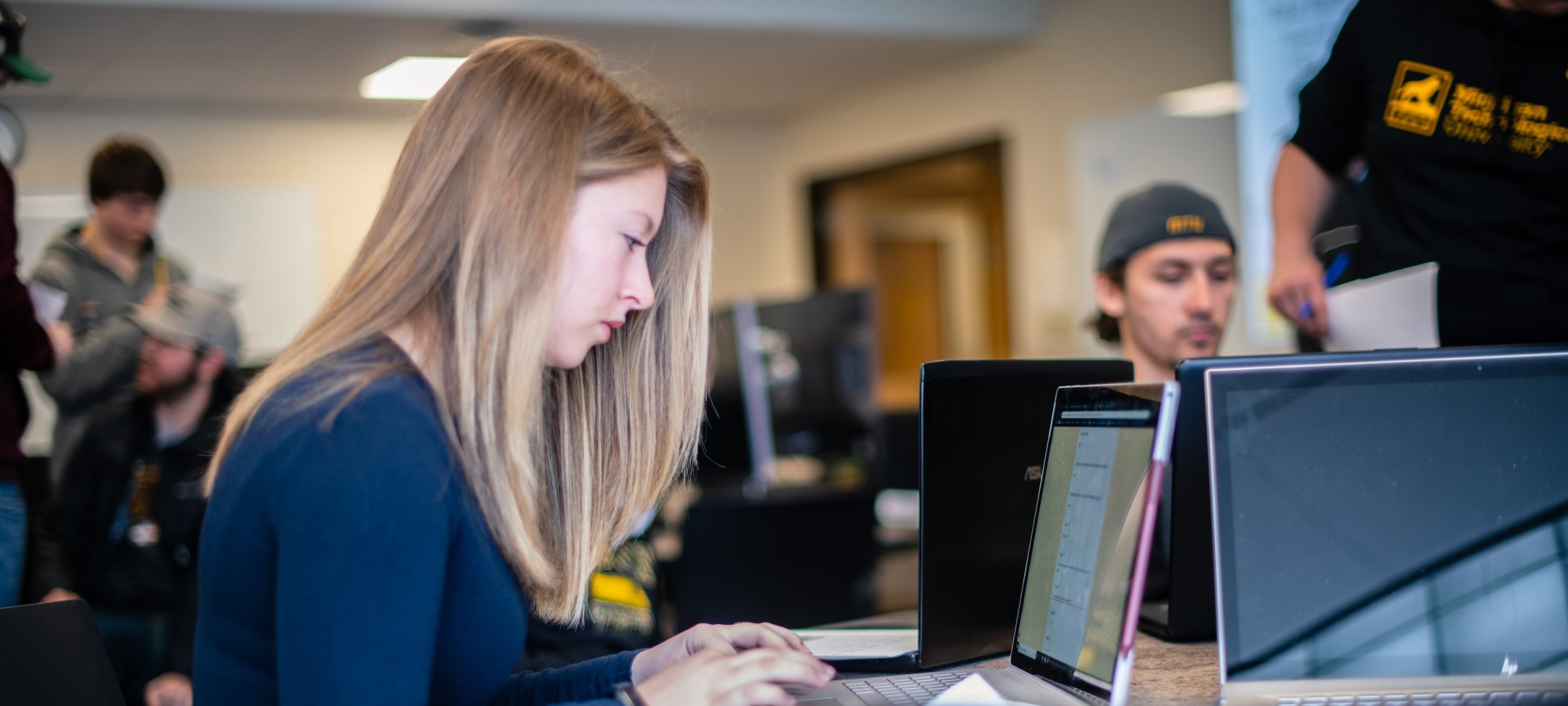 Students learn engineering in teams and with computing tools.