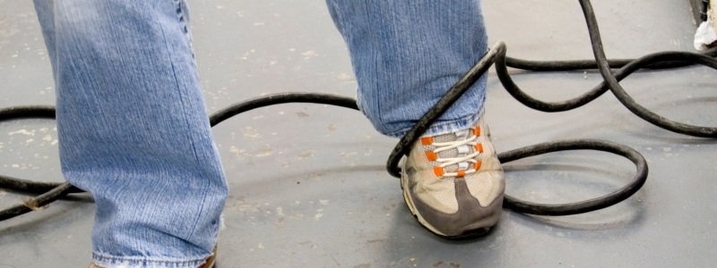 Person's foot caught in a hose.