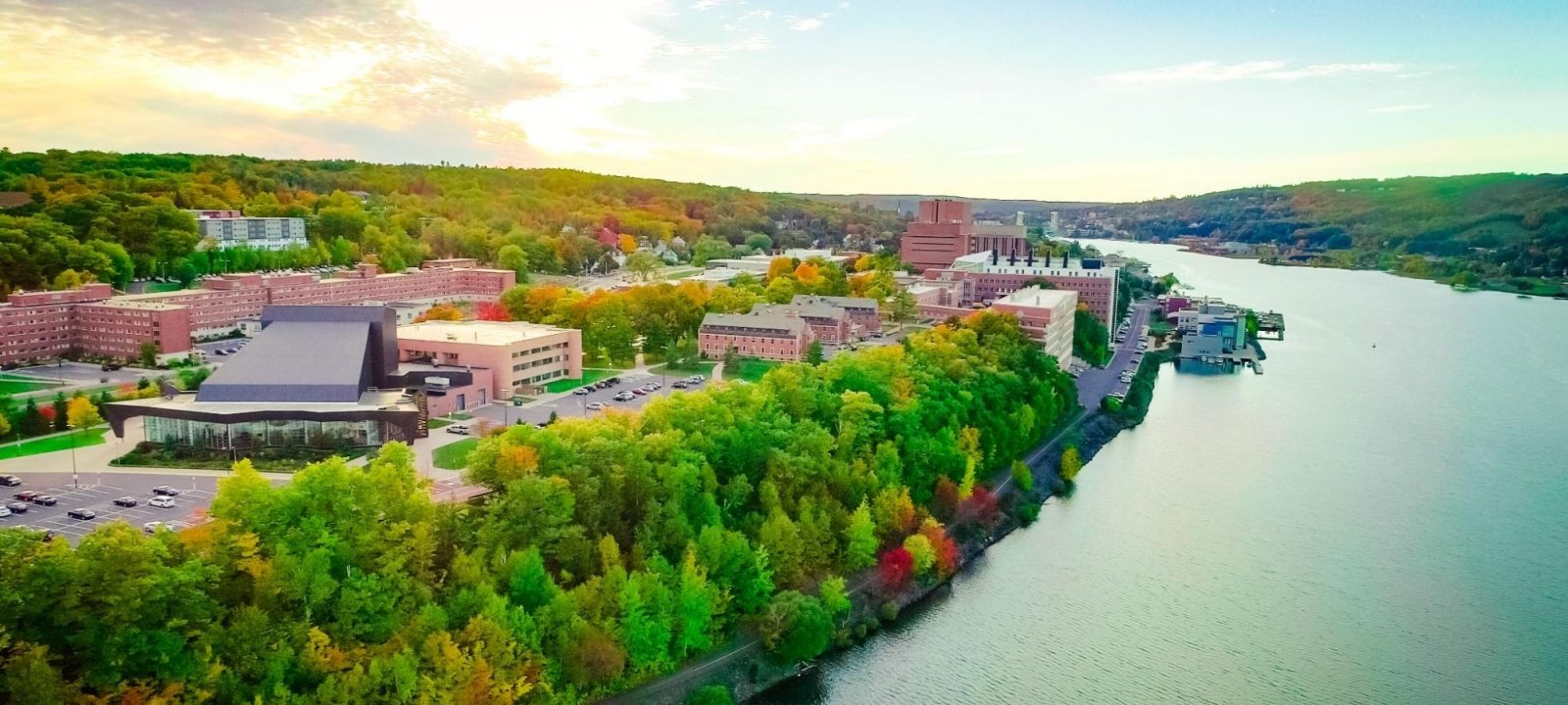 Michigan Tech campus in early autumn, featuring the Portage Canal.