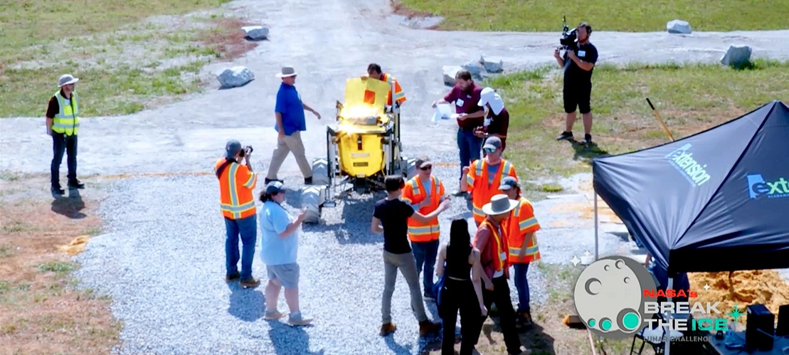 A group inspects the PSTDL rover.